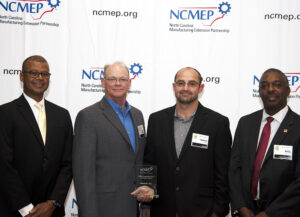 L-R: Kenny Flowers, NC Department of Commerce Assistant Secretary; Bill Murphy, Alotech President; Tommy Kirk, Alotech COO; Phil Mintz, Executive Director Industry Expansion Solutions and North Carolina Manufacturing Extension Partnership