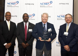 L-R: Kenny Flowers, NC Department of Commerce Assistant Secretary; Phil Mintz, Executive Director Industry Expansion Solutions and North Carolina Manufacturing Extension Partnership; Rick Coffey, McCreary Modern President; Doug Yoder, McCreary Modern CFO