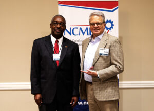 L-R: Phil Mintz, Executive Director Industry Expansion Solutions and North Carolina Manufacturing Extension Partnership; Chris Bevin, Nester Hosiery Senior Vice President